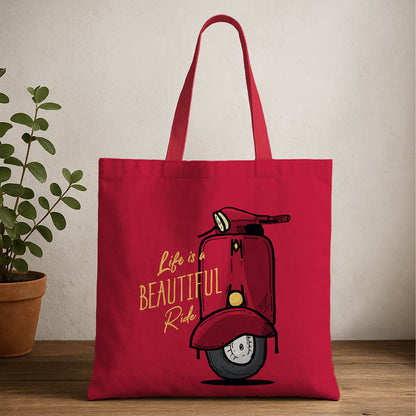 A red tote bag featuring a graphic of a scooter printed on its surface.