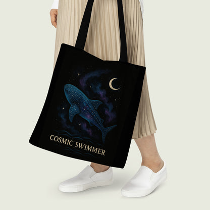 Tote bag with a whale shark unique cosmic swimmer illustration, merging cosmic and aquatic themes in a vibrant, eye-catching style.