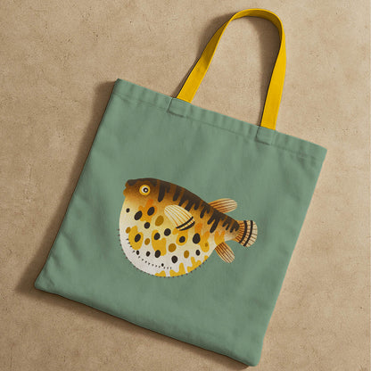 A tote bag showcasing a playful puffer fish graphic in bright colors.