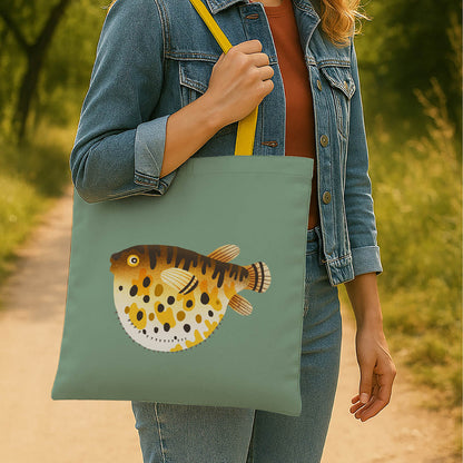 A stylish tote bag adorned with a vibrant puffer fish illustration