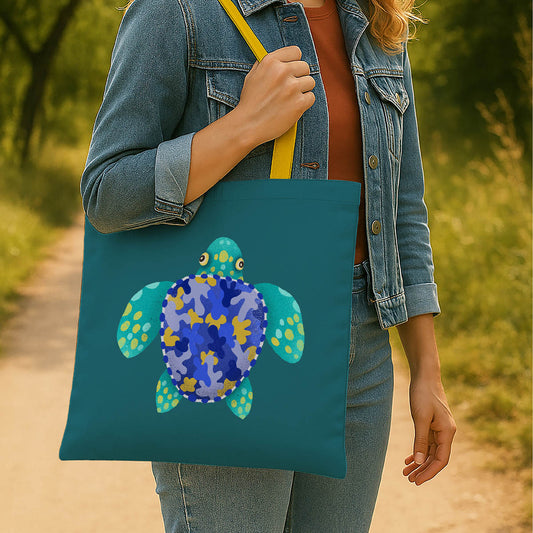 A vibrant blue and yellow tote bag adorned with a turtle graphic, showcasing a playful marine theme.