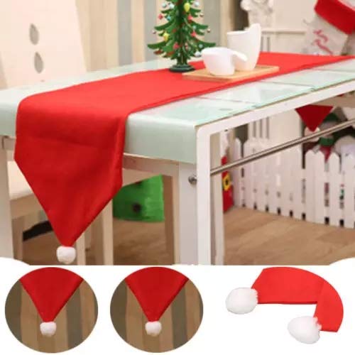 Christmas table setting featuring a vibrant red table runner.