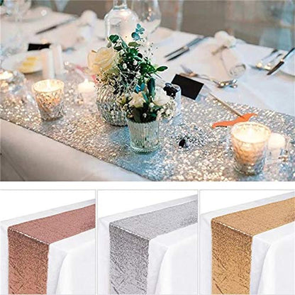 Elegant table adorned with silver, gold, and copper table runners, creating a luxurious ambiance.