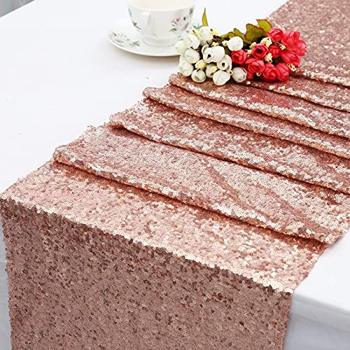  A rose on a table with sequin table runner.