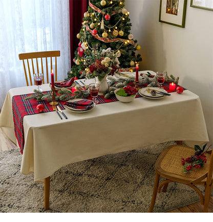 . Elegant table setting showcasing red and blue plaid placemats, perfect for a casual dining experience.
