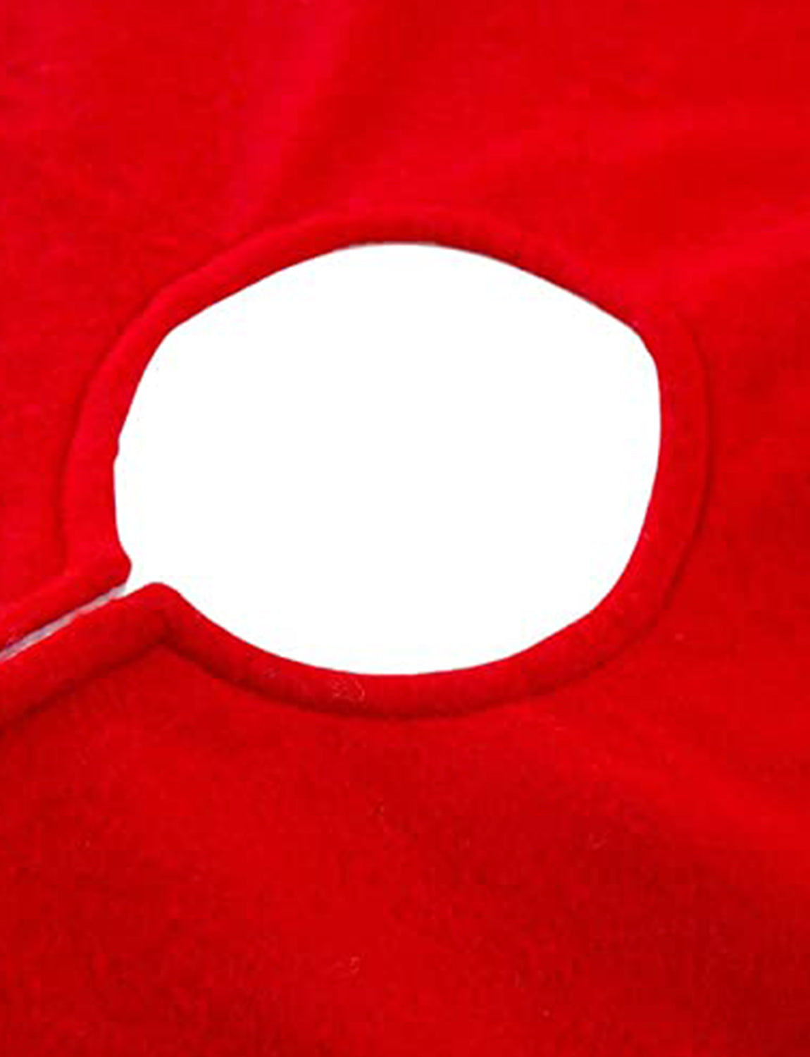 Close-up of a red fabric with a white circular cutout