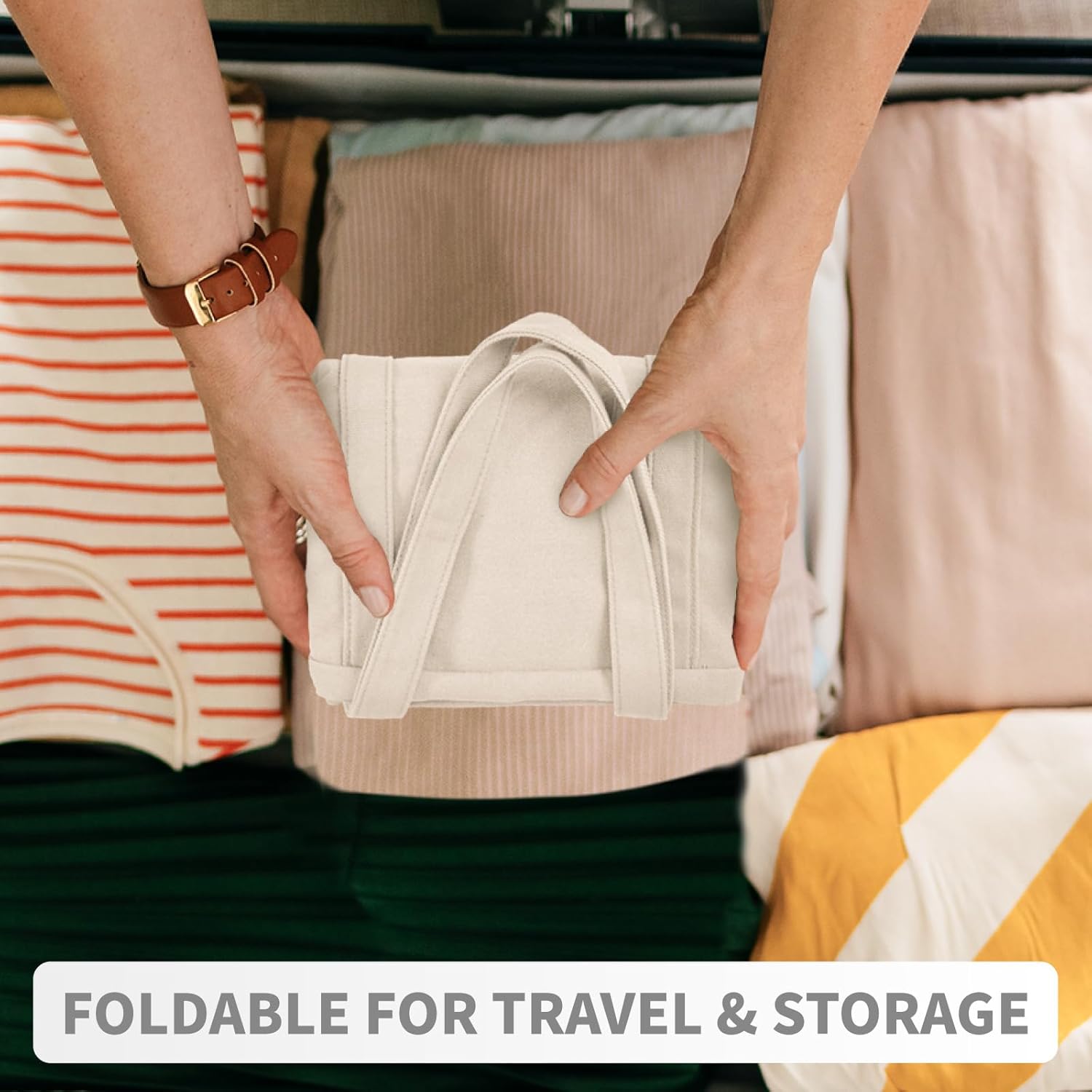 Person holding a beige travel organizer with clothes in the background, text 'Foldable for Travel & Storage'.
