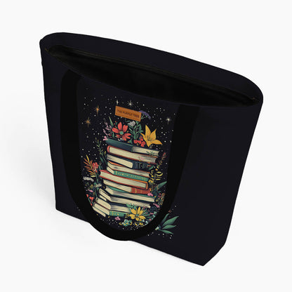A tote bag adorned with books and blooming flowers, representing a harmonious mix of education and beauty.