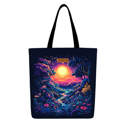 A tote bag featuring a vibrant painting of a forest under a colorful sunset.