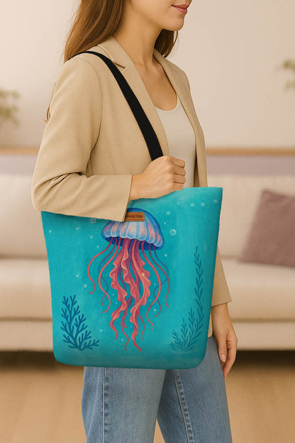 A stylish tote bag adorned with a vibrant jellyfish illustration, showcasing its delicate tentacles.