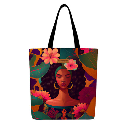 A tote bag featuring a woman surrounded by colorful flowers and leaves, showcasing a vibrant and nature-inspired design.
