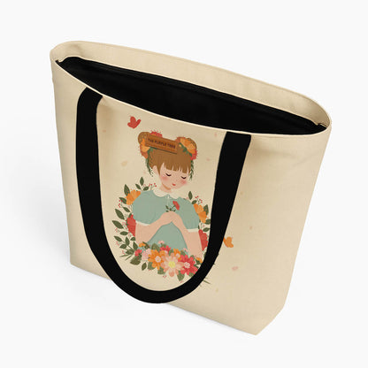 A tote bag illustrating a girl grasping flowers, with butterflies fluttering around her, creating a whimsical scene.